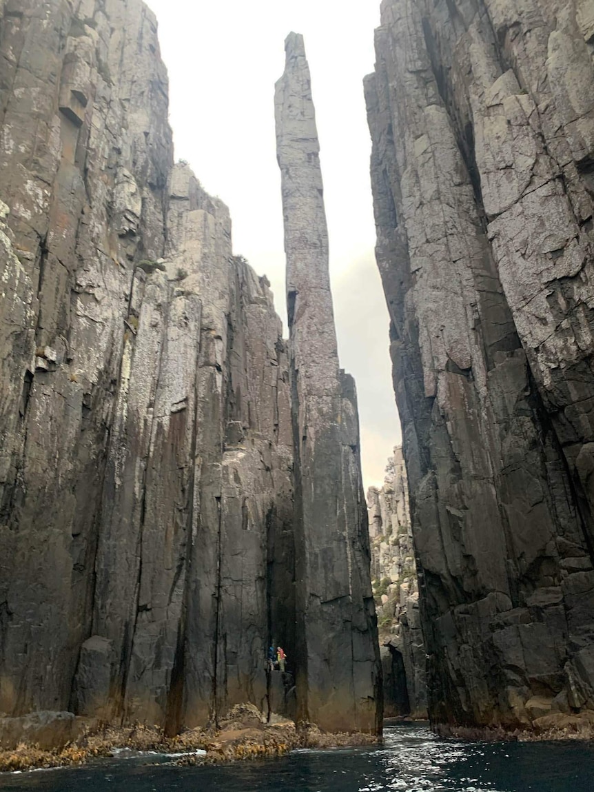 Climbers at the base of The Candlestick