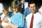 Prince Charles and Princess Diana, carrying Prince William, arrive in Alice Springs in 1983