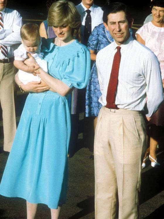 Prince Charles and Princess Diana, carrying Prince William, arrive in Alice Springs in 1983