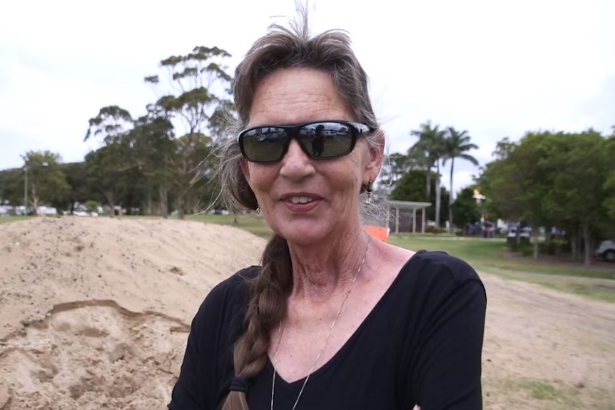 A woman standing outside.