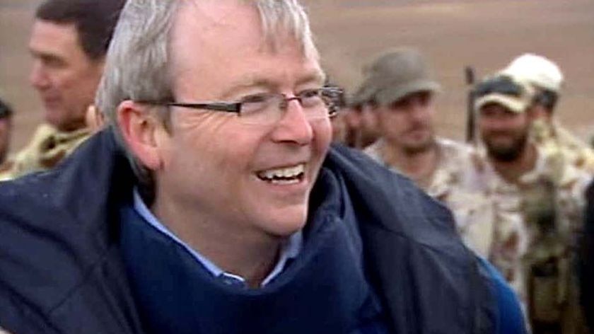 Prime Minister Kevin Rudd smiles as he makes a surprise visit to Afghanistan