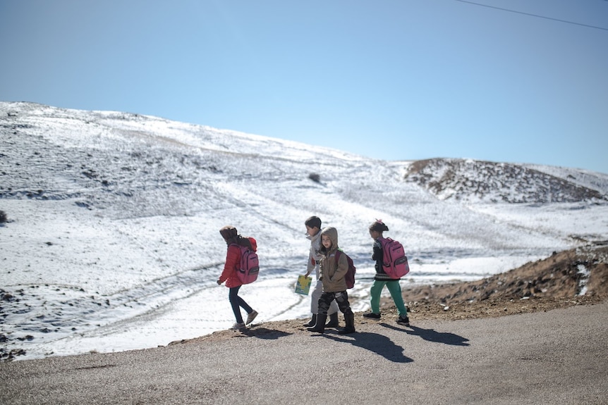 Children walk home from school in the Amazigh Timahdite village.