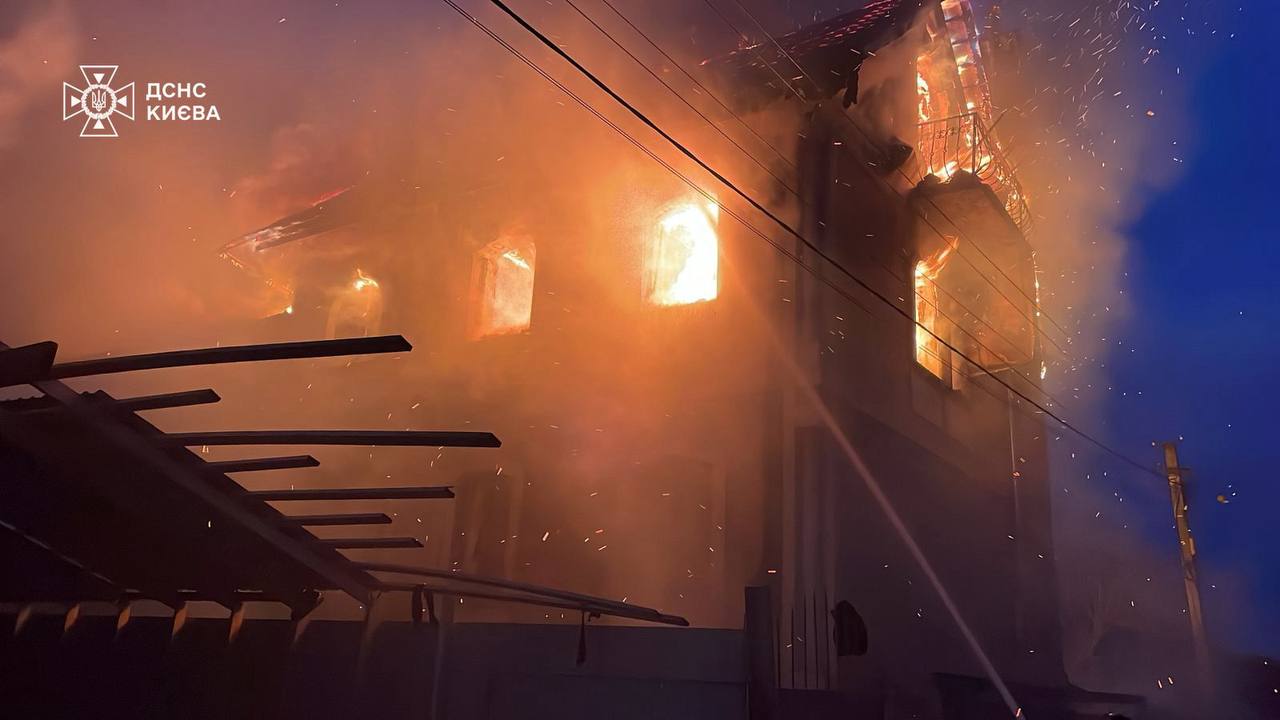 A building on fire in Kyiv following an attack by Russian forces