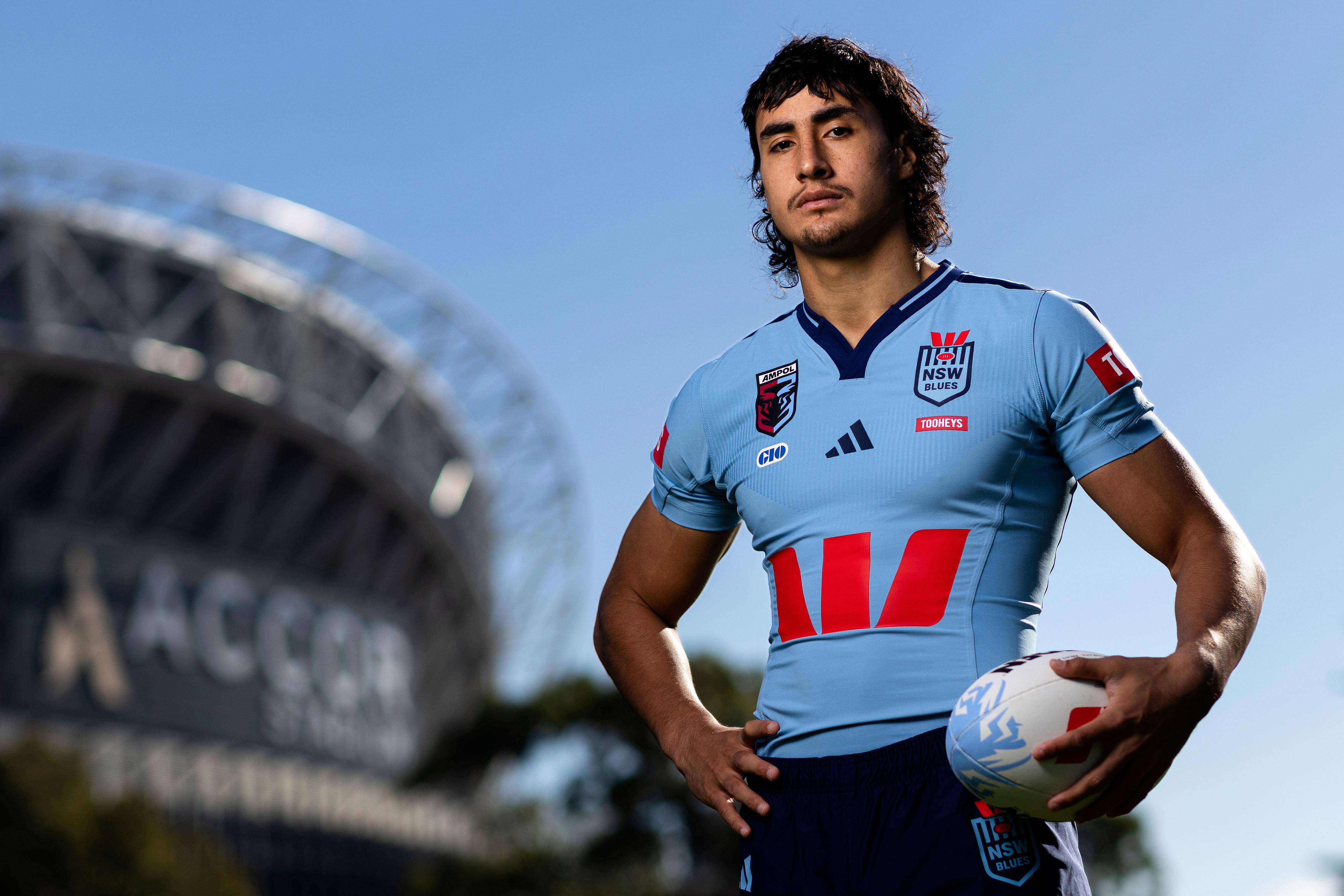 Casey McLean poses for a photo in his New South Wales Origin jersey