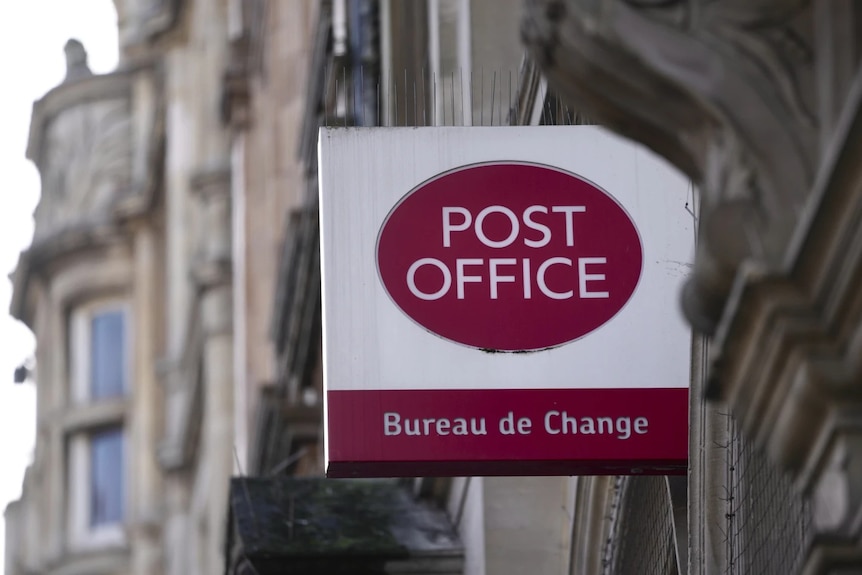 A british post office sign.
