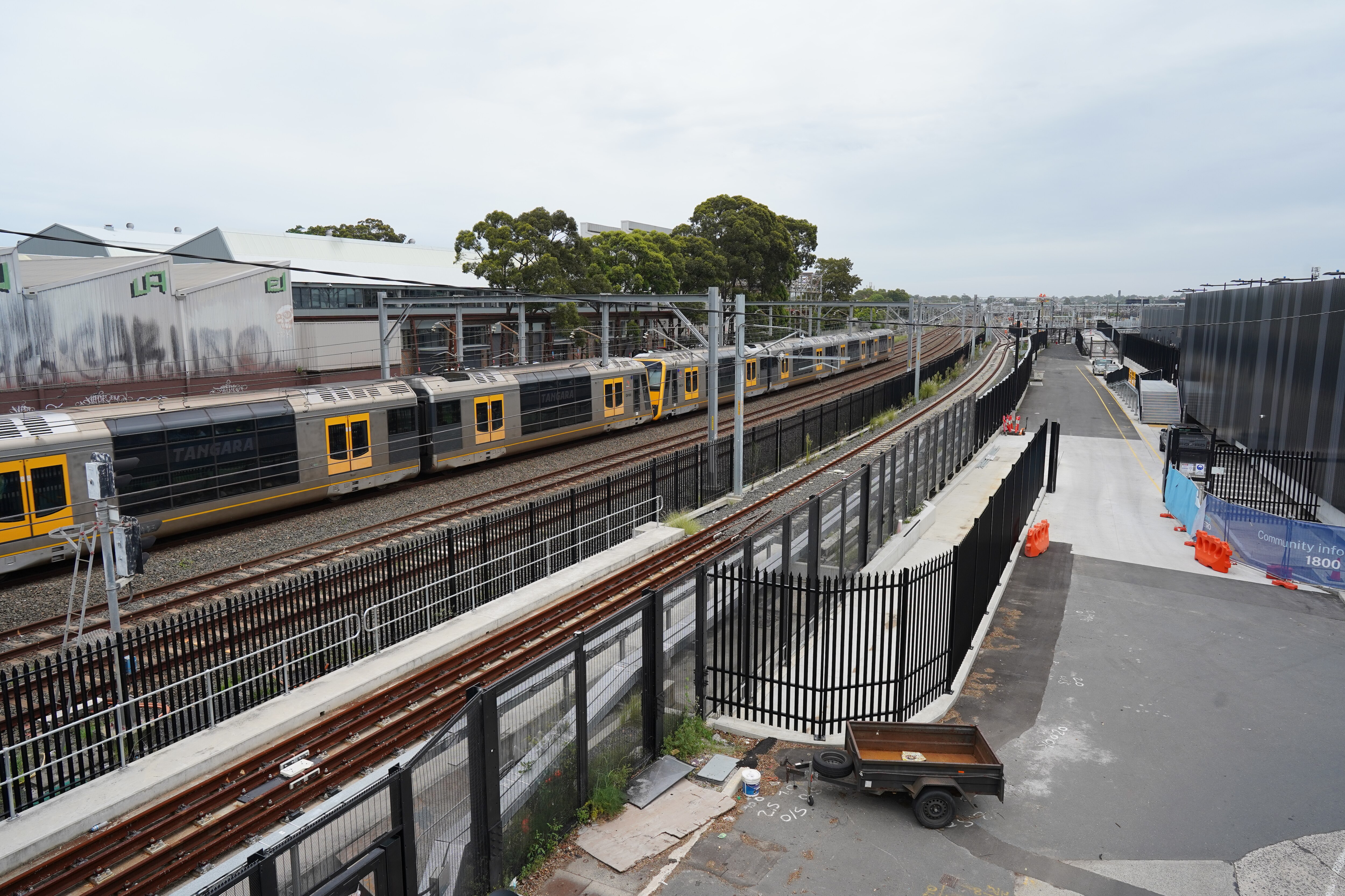 Train track with metro line next to it.