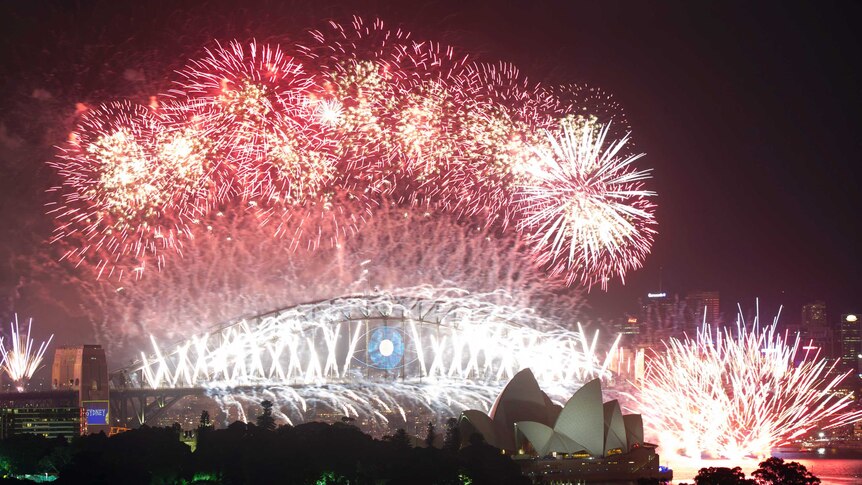 Fireworks explode over Sydney Harbour
