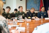 General Wei Liang is pictured with other Chinese military officials at a roundtable meeting in Canberra.