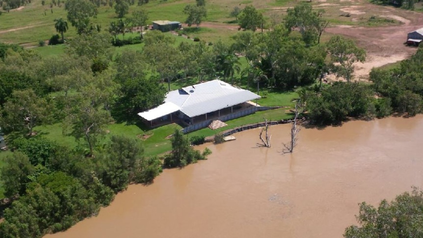 a river running near a house