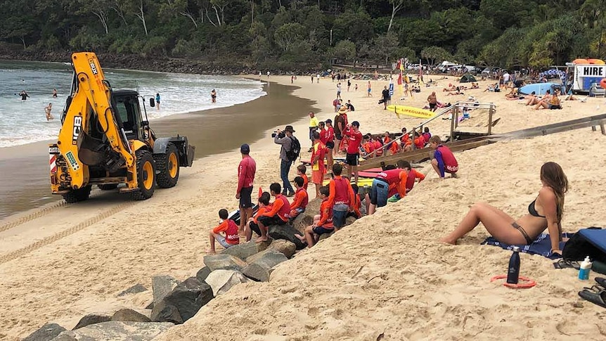 An earth mover on Noosa Beach