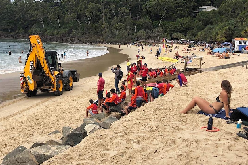 An earth mover on Noosa Beach