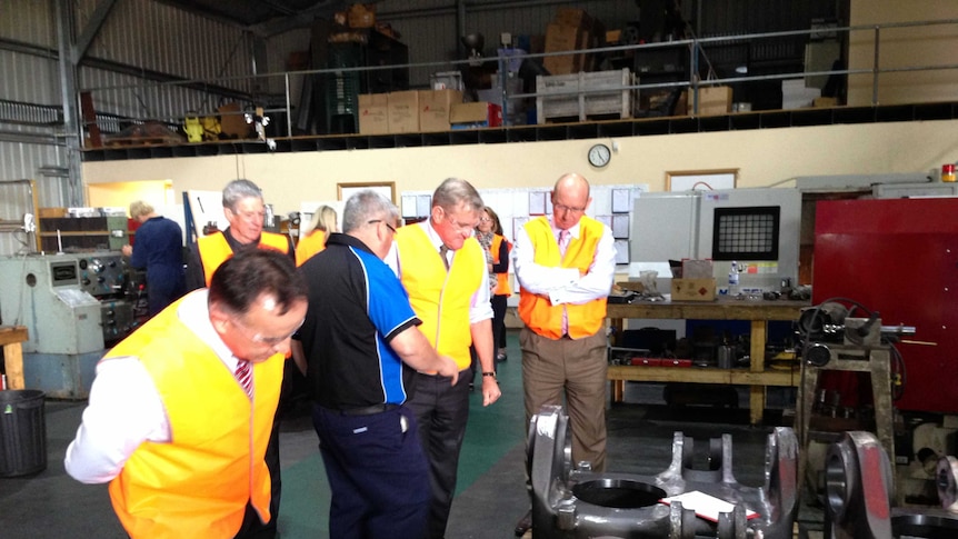 Federal Industry Minister Ian Macfarlane hears about the plans of grant recipient GJ Engineering