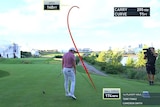 Cam Smith drops his head after his tee shot. The shot-tracer shows the ball slicing well right