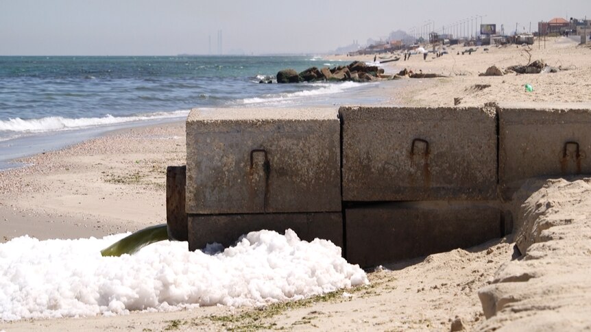 Pipe on Gaza's beachfront spews sewage into the Mediterranean.