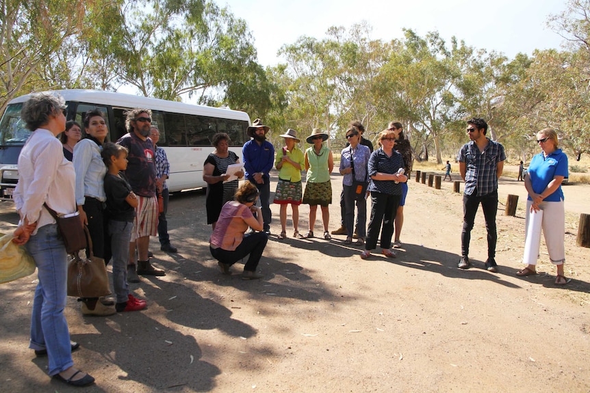 Senior custodian Doris Stuart explains the significance of Heavitree Gap (Ntaripe) during a recent sacred sites tour