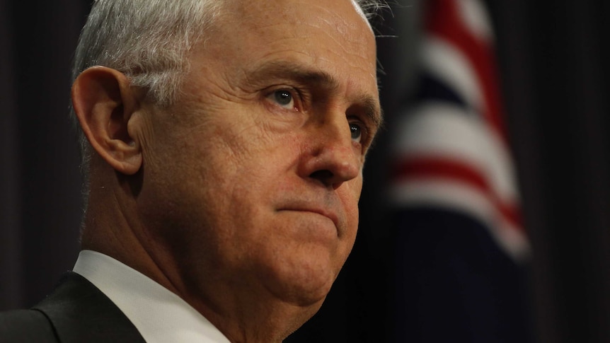Malcolm Turnbull looks serious in a close-up photo of the Prime Minister.