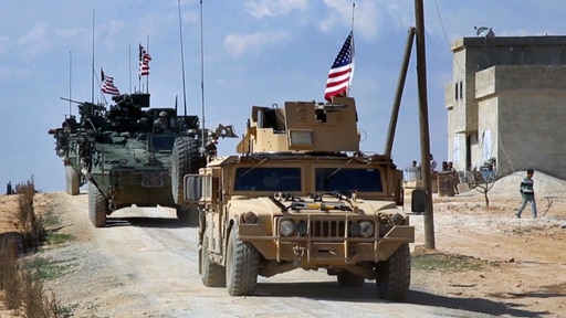 US Army tanks patrolling the outskirts of Manbij in Syria.