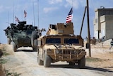 US Army tanks patrolling the outskirts of Manbij in Syria.