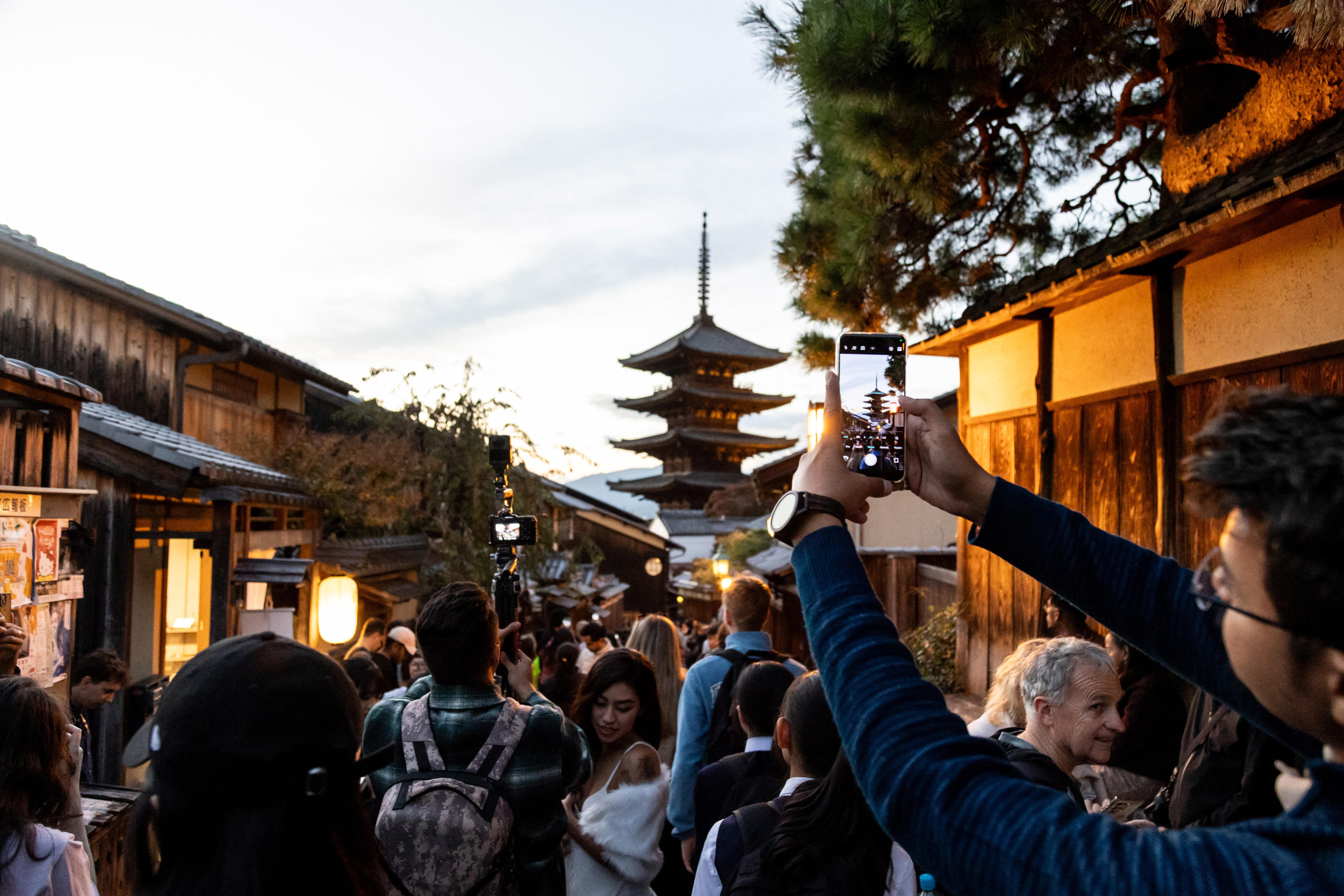 Tourists are flooding Japan's famous places. Have they reached their limit?