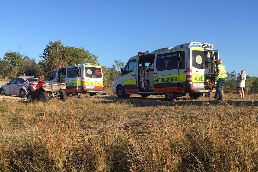 Two ambulances and police attend a crash scene in regional Australia.