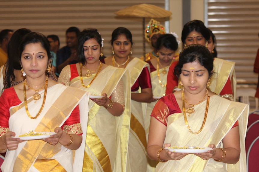 The Onam Harvest Festival usually includes traditional dancing and singing.