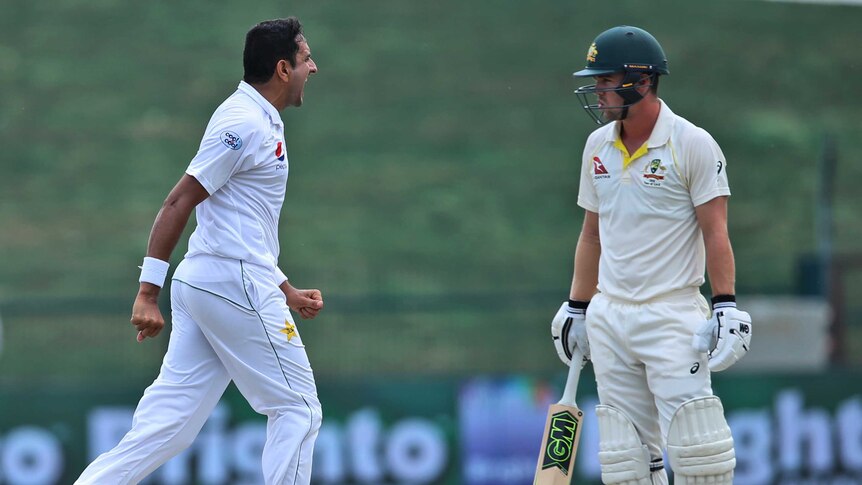 Pakistan's Mohammad Abbas celebrates the dismissal of Australia's Travis Head.