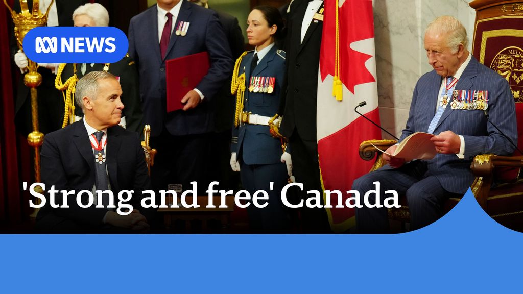 'Strong and free' Canada: King Charles sits on a throne reading a speech, Canadian flag beside him, PM Mark Carney watches on.