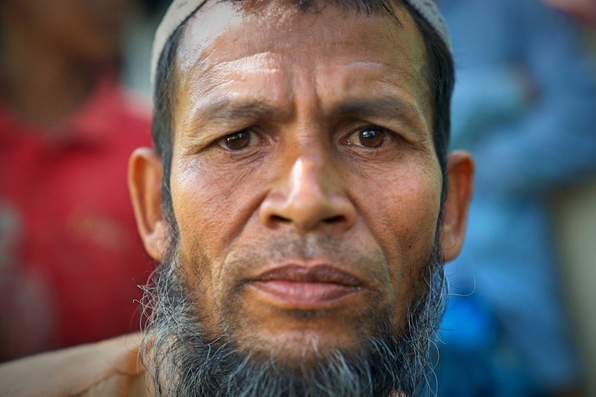 A closeup of the face of Sayed Akbar.