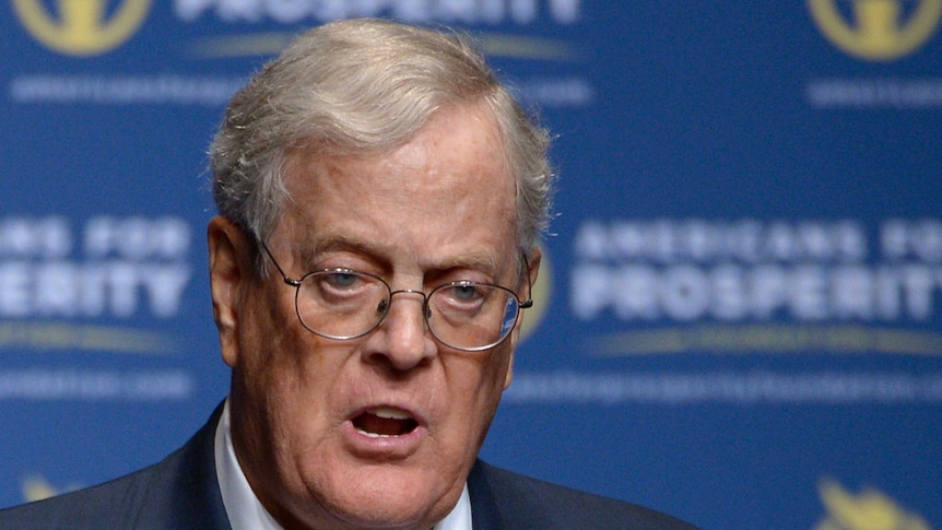 Close-up of David Koch speaking