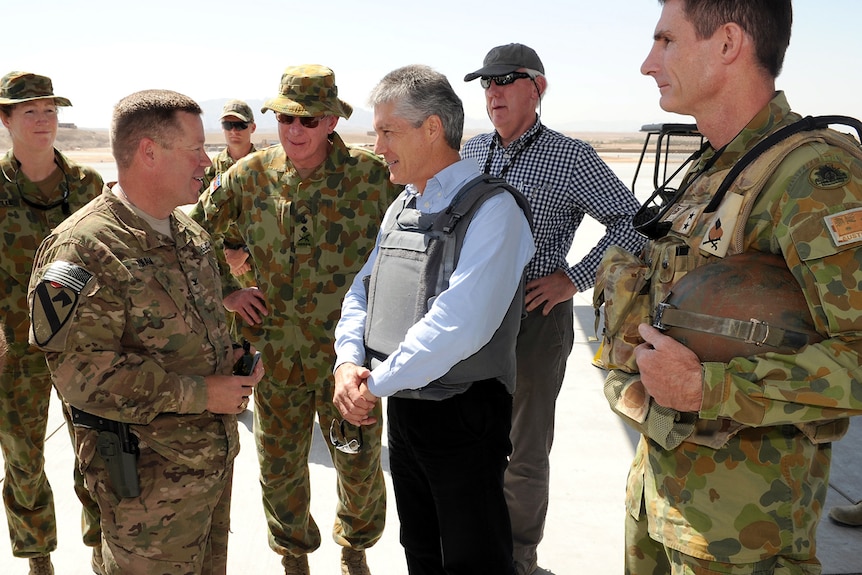Stephen Smith talks to US Army Colonel Bob Akam, Commander Combined Team Uruzgan, and General David Hurley