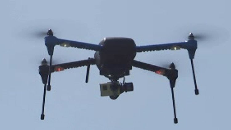 An octocopter drone flies during a demostration.