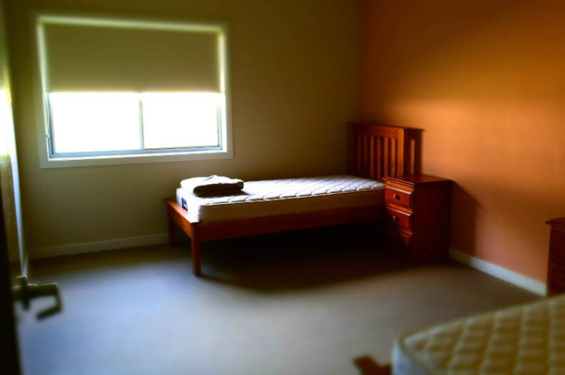 An empty bedroom at Kamira. (ABC: Jason Om)