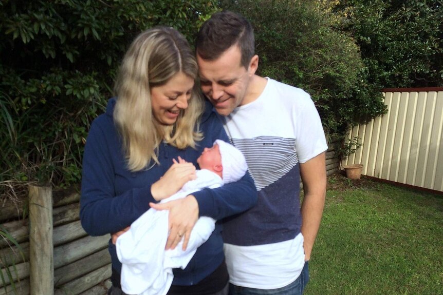 Nicola Goring with her husband and baby.