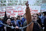 Wilting economy: demonstrators protest outside the Greek parliament in Athens on April 27, 2010.
