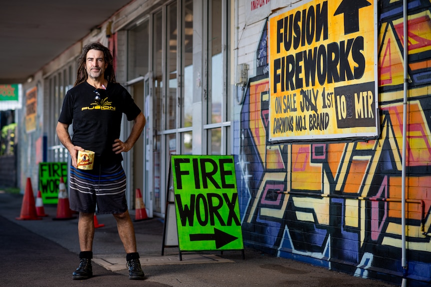 Matt Dillon stands outside his fireworks store.