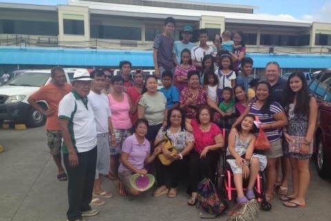 Jezzie and her family in the Philippines