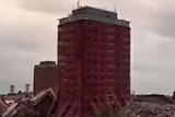 Two tower blocks at the Red Road Flats in Glasgow remain standing after a controlled demolition.
