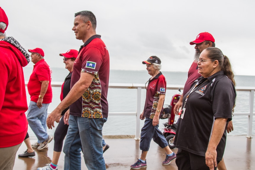 Walkers near the boardwalk at Shorncliffe.