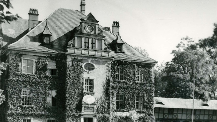 A black and white image of a German mansion