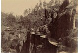 Old photo of the view towards a rotunda overlooking cliff walkway, at Launceston's Cataract Gorge.