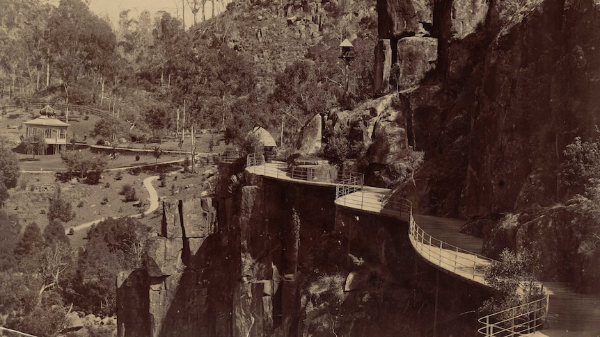 Old photo of the view towards a rotunda overlooking cliff walkway, at Launceston's Cataract Gorge.