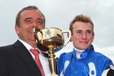 Woehler and Moore celebrate with Melbourne Cup