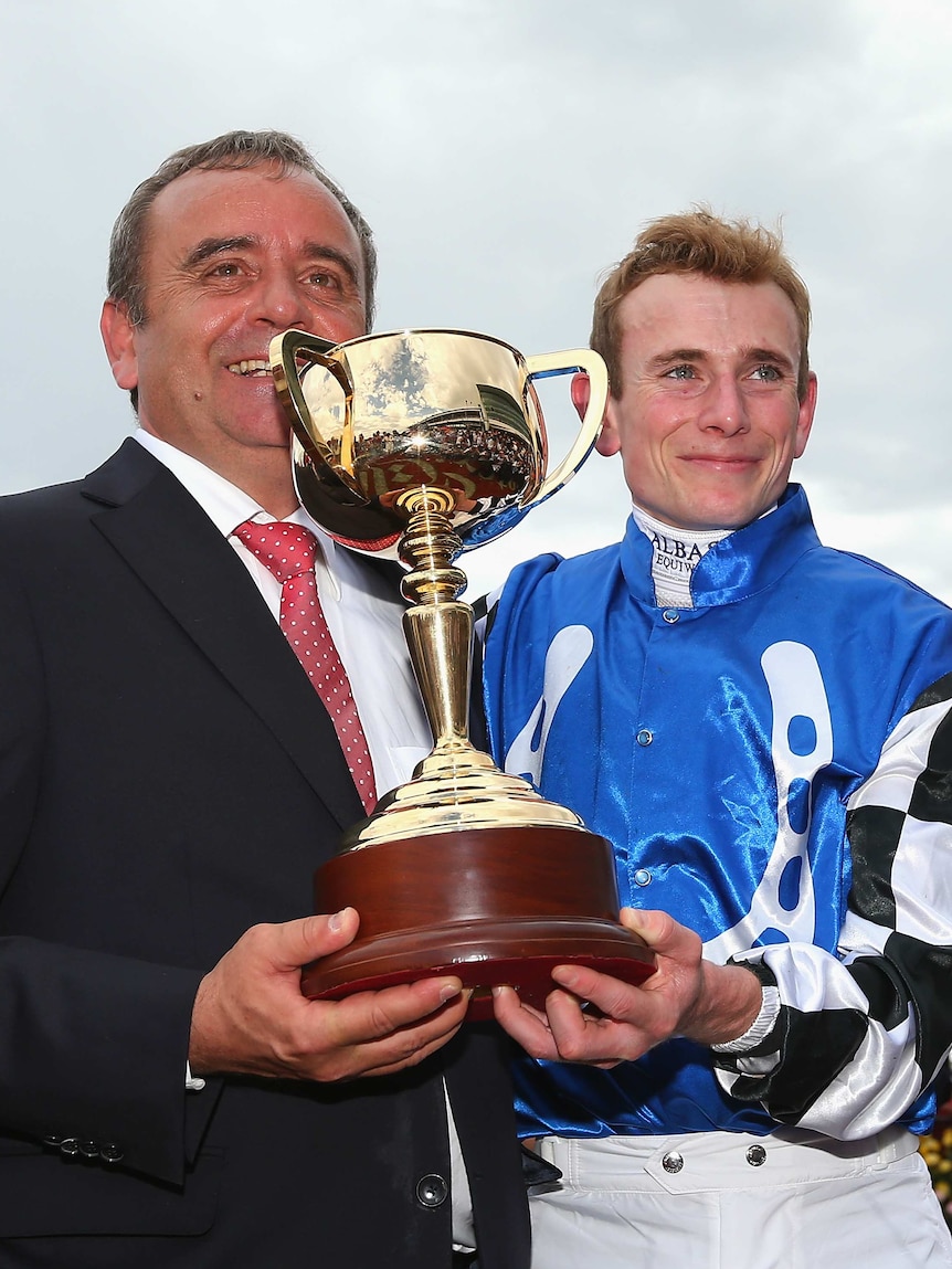 Woehler and Moore celebrate with Melbourne Cup