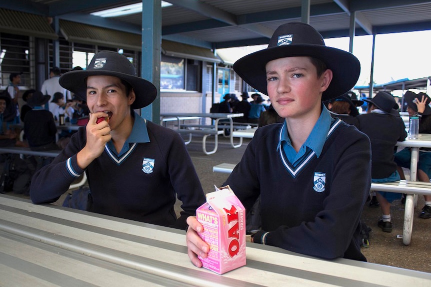 Jayden Liu-Batista and James Dunlop enjoy lunch together at Mansfield State High School.