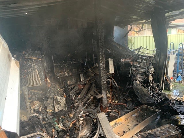 A burnt out shed.