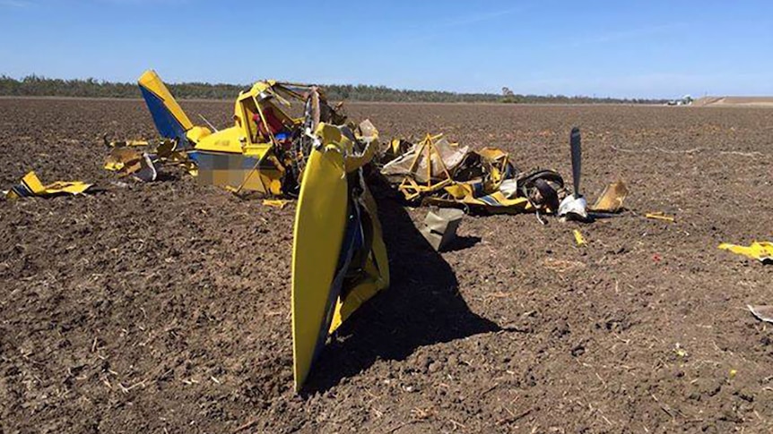 Wreckage of a crop duster strewn in a field near Goondiwindi
