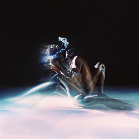 A blurry photo of a naked body on the cover of Yves Tumor's Heaven to a Torured Mind