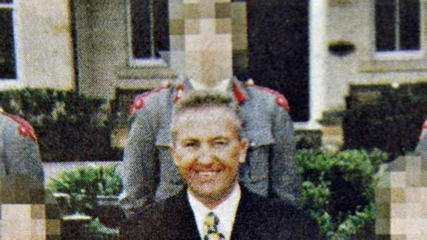 Former Sydney prep school teacher Gregory Coupland (centre) poses in a school photo.