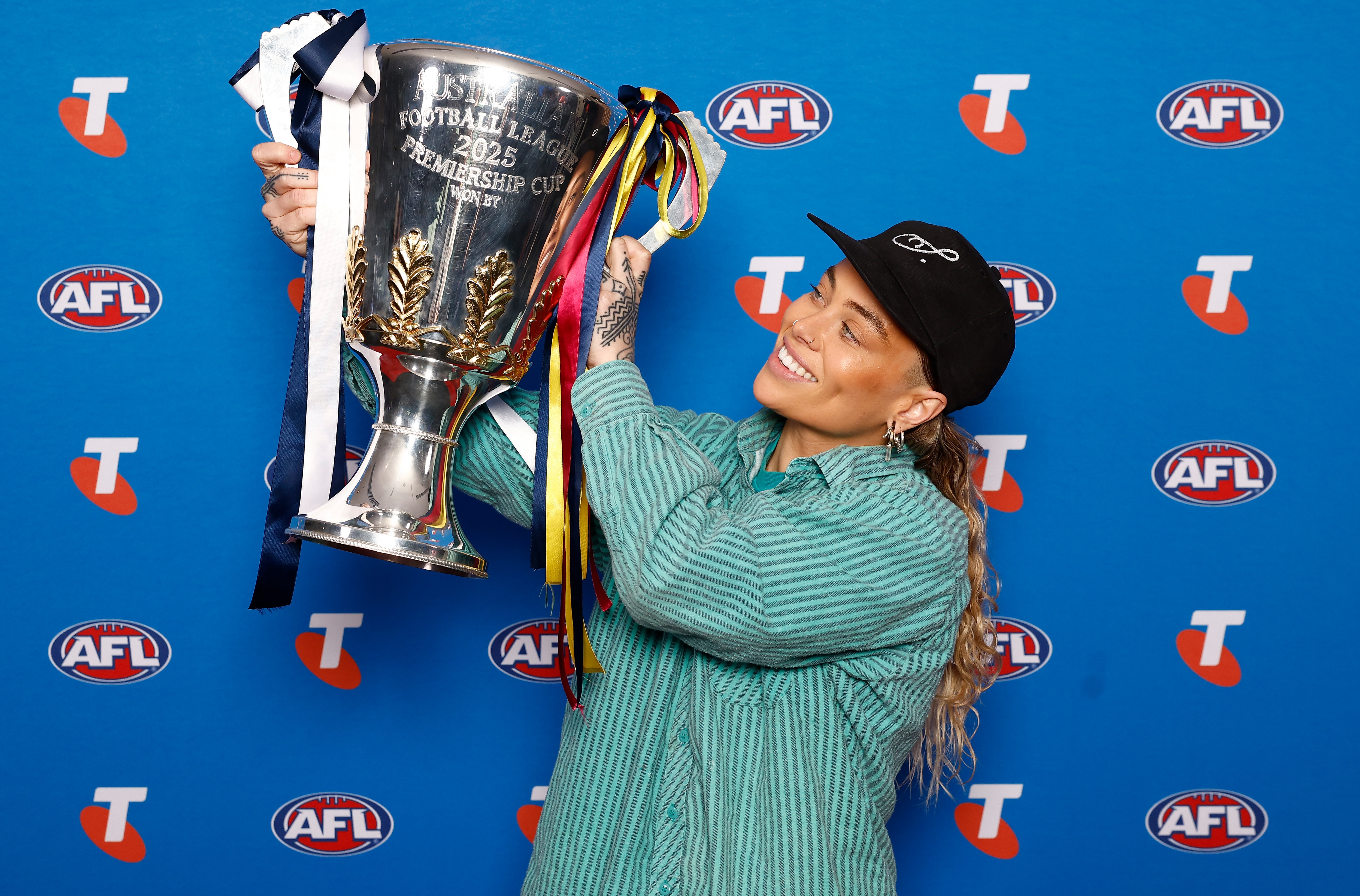 Quiz: Australian musician or Australian Rules footballer?