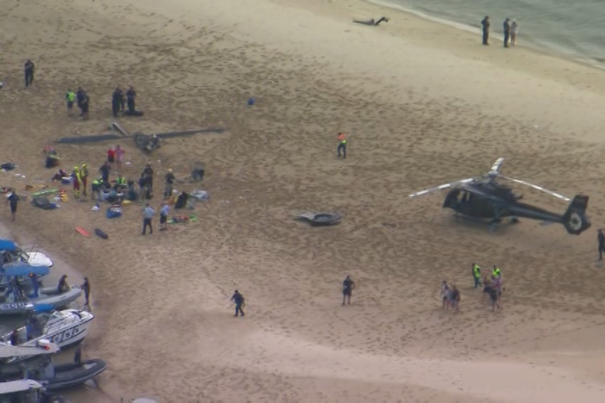 Wreckage on a sand island.